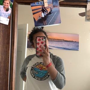 White O’Neil shirt with grey sleeves.